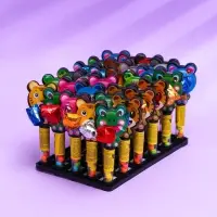 Драже сахарное"Зверята" в тубе с игрушкой, 2 г