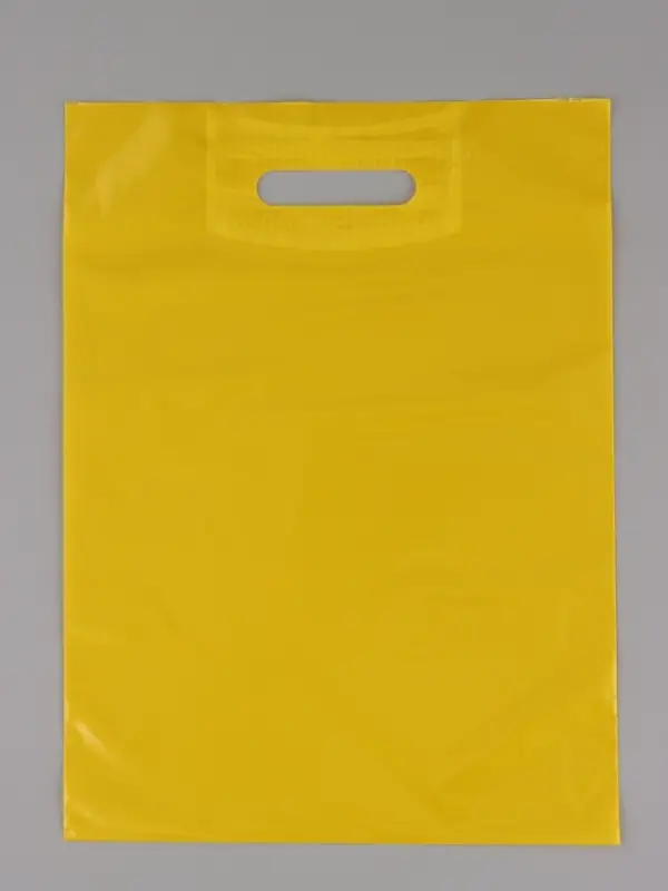 Пакет полиэтиленовый с вырубной ручкой, Желтый 30-40 См, 60 мкм