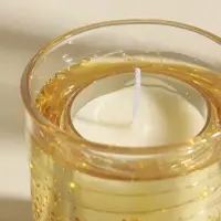 Свеча интерьерная в стакане с LED-подсветкой "Золотые звёздочки" 8х8х9 см