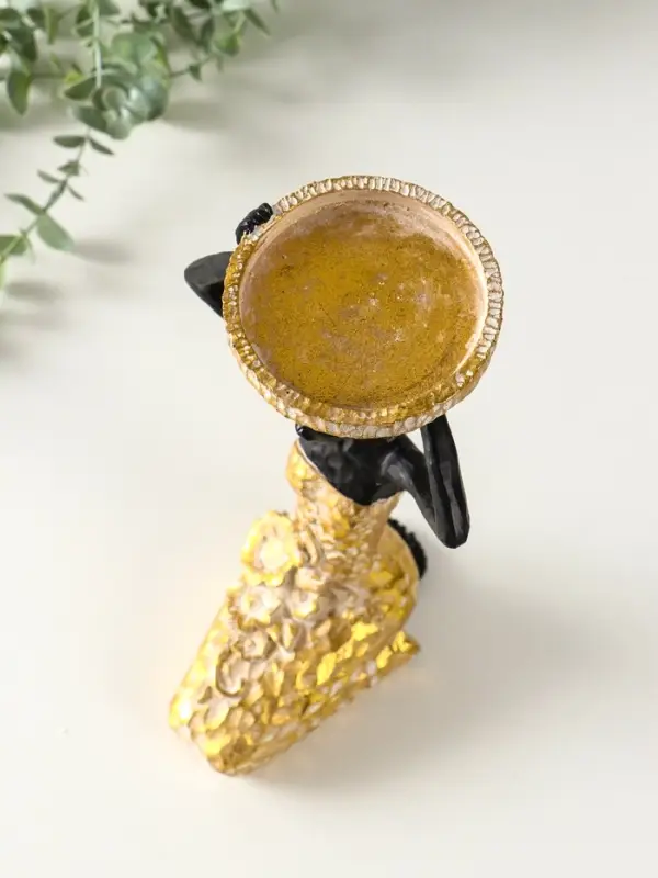 Подсвечник полистоун "Африканка в косынке с цветами" золото d=8 см 14х15х27,5 см