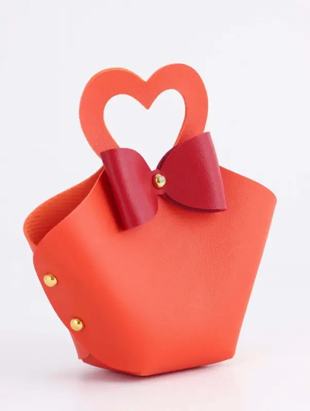 Кожанная подарочная сумочка 10,5 х 5 х 6 см оранжевая