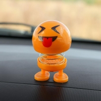 Смайл на пружинке, на панель в авто, язык, желтый Смайл на пружинке, на панель в авто, язык, желтый