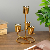 Подсвечник металл на 4 свечи "Спираль" золото 16х9х9 см Подсвечник металл на 4 свечи "Спираль" золото 16х9х9 см