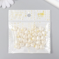 Бусины для творчества пластик "Жемчужные сердца с узорами" набор 30 шт 0,5х1,1х1,2 см