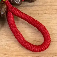 Сувенирный музыкальный инструмент "Погремушка" орех кемири, 16х10х3 см, МИКС