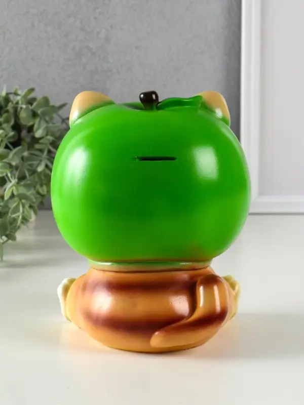 Копилка "Кот в костюме яблоко"зелёный, 21х17х17 см