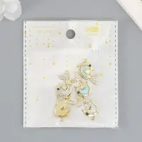 Декор для творчества металл, стразы "Двойной дельфин" голубой 2,2х2,1 см