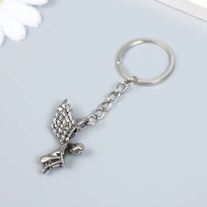 Брелок металл "Девушка-ангел - одиночество" 3х0,5х3 см