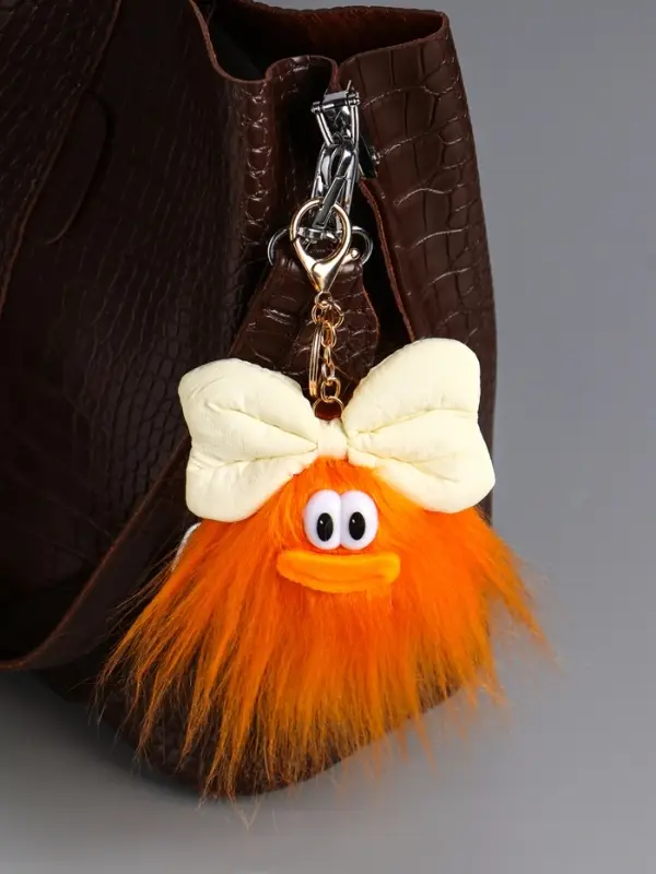 Пушистик на кольце "Чучундра с бантиком" оранж 18х10х5 см