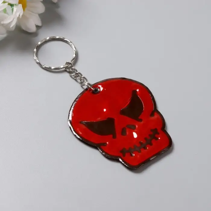 Брелок пластик светоотражающий "Череп" МИКС 5,5х5 см