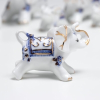 Сувенир керамика "Слоны с синей росписью" набор 7 шт h= 11 см 31,5х23,5 см Сувенир керамика "Слоны с синей росписью" набор 7 шт h= 11 см 31,5х23,5 см