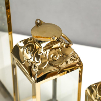 Подсвечник металл, стекло фонарь "Завитки" золото н-р 3 шт 55х18х18 37х14х14 24х10х10 см