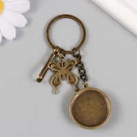 Брелок металл, стекло с карабином "Бабочки в медальоне" бронза 9,5 см Брелок металл, стекло с карабином "Бабочки в медальоне" бронза 9,5 см