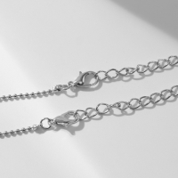 Кулоны &laquo;Неразлучники&raquo; космонавт и летающая тарелка, цвет сине-белый в серебре, 40 см