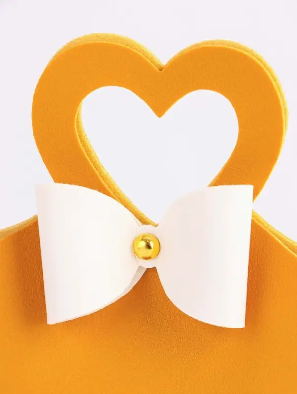 Кожанная подарочная сумочка 10,5 х 5 х 6 см желтая