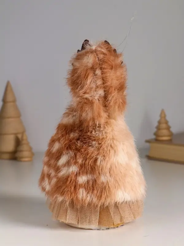 Кукла интерьерная "Девочка в меховой накидке, в шапке с рожками" 7х7х19 см