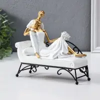 Сувенир полистоун "Парочка лежит на кушетке" бело-золотой 7х21,5х18,5 см
