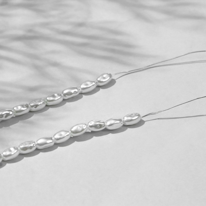 Бусины пластиковые на нити &laquo;Жемчуг&raquo; рис 0,7&times;0,5&times;0,5 см, (набор 150 шт.), цвет белый