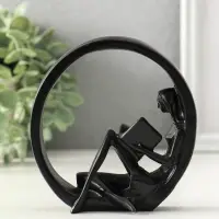 Сувенир полистоун "Девушка читает книгу" чёрный 4х11,3х11,7 см