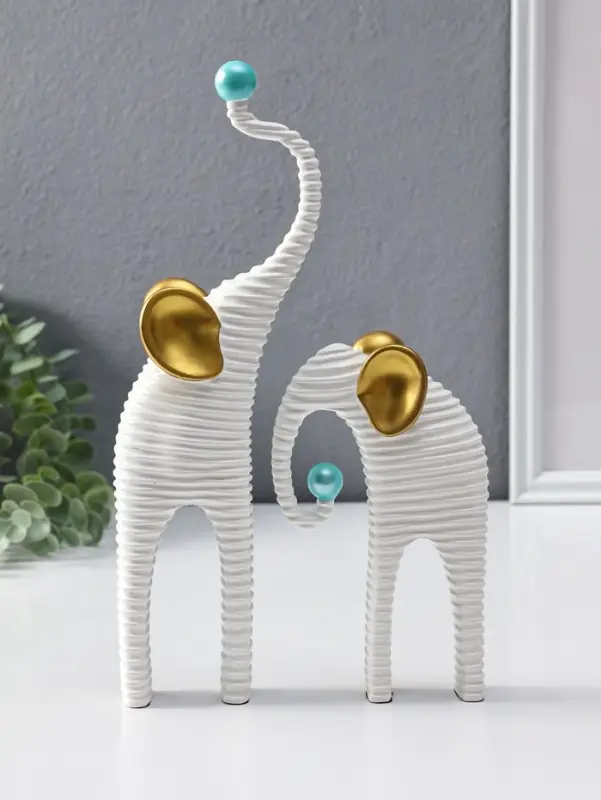 Сувенир полистоун "Слоны. Гофре" белый с золотом набор 2 шт 5х10х16,5 5,5х16,5х29,5 см