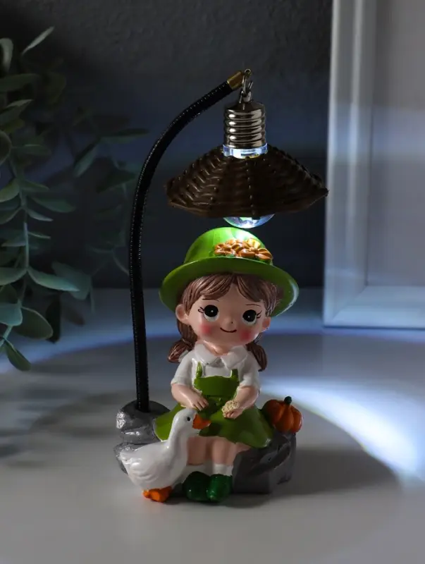 Сувенир полистоун свет "Малышка в шляпке, с гусём" зелёный 3хAG3 5,5х7х17 см