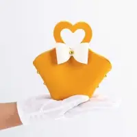 Кожанная подарочная сумочка 10,5 х 5 х 6 см желтая