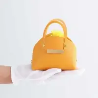 Кожанная подарочная сумочка 14 х 6,5 х 12,8 см желтая