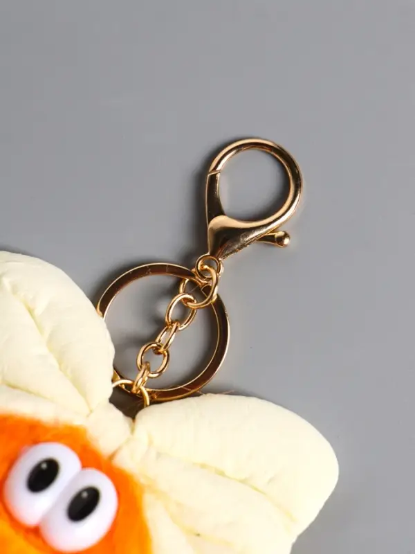 Пушистик на кольце "Чучундра с бантиком" оранж 18х10х5 см