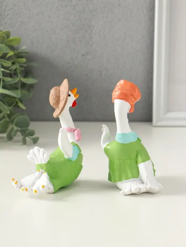 Сувенир полистоун "Гусь и гусыня в зелёных нарядах" набор 2 шт 6х11х11,7 см