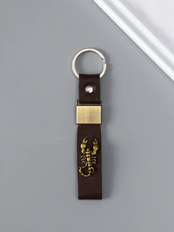 Брелок кожзам "Ремешок со скорпионом" 2,2х10 см