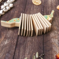 Сувенирный музыкальный инструмент "Трещотка крокодил пятнистый" дерево 4x27x9 см МИКС