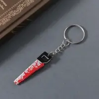 Брелок акрил зеркальный "Окровавленная пила" 5,1х1,3х0,3 см