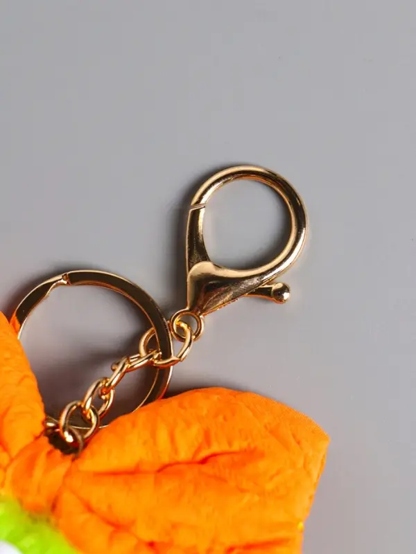 Пушистик на кольце "Чучундра с бантиком" салатовая 18х10х5 см