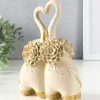 Сувенир полистоун " Парочка слонов с цветочными ушами" песочный 8х17х25,5 см