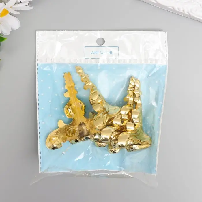 Уголок (ножка) для шкатулки "Фигурная" 6,2х4 см С-023