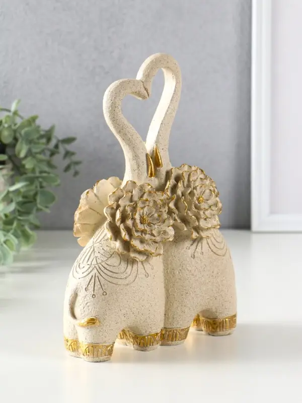 Сувенир полистоун " Парочка слонов с цветочными ушами" песочный 8х17х25,5 см