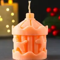 Свеча новогодняя "Карусель с лошадками" 60х80 мм, персиковый