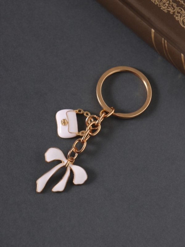 Брелок металл, эмаль "Сумочка и бант" белый 9 см