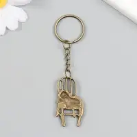 Брелок металл "Кот  на стуле" бронза 2,2х4,1 см