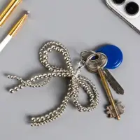 Брелок на карабине "Двойной бант" серебро, бусины d=0,4 и 0,5 см 11,5х9,5х1 см