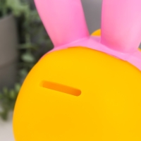 Копилка пластик "Уточка с заячьими ушками" МИКС 13х13х23 см