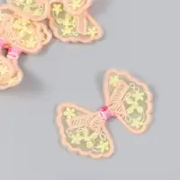 Декор для творчества текстиль вышивка "Бантик в цветочках оранжево-жёлтый" 7х5,5 см