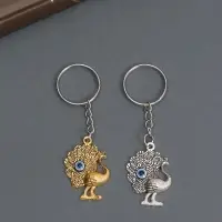 Брелок металл глазки "Павлин" МИКС 2,5х3 см