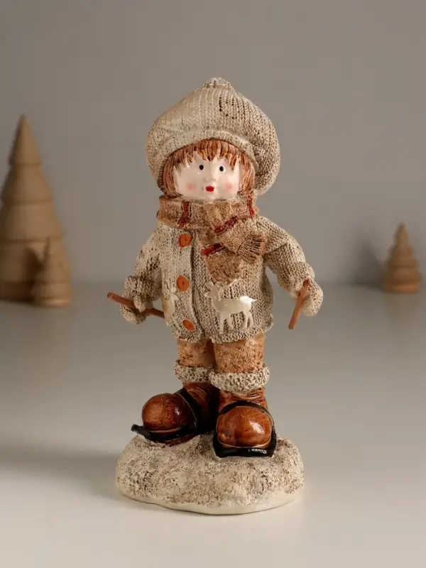Сувенир полистоун "Малыш в вязаном наряде на мини-лыжах" 8,5х8х17,5 см