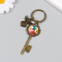Брелок металл, стекло "Ангел и ключ с цветами" бронза 10 см Брелок металл, стекло "Ангел и ключ с цветами" бронза 10 см
