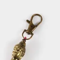 Брелок-кисточка "Будда" 17 см, цв. фуксия, золотистый