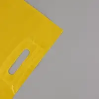 Пакет полиэтиленовый с вырубной ручкой, Желтый 30-40 См, 60 мкм