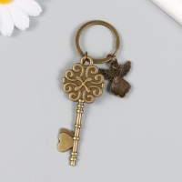 Брелок металл, стекло "Ангел и ключ с цветами" бронза 10 см Брелок металл, стекло "Ангел и ключ с цветами" бронза 10 см