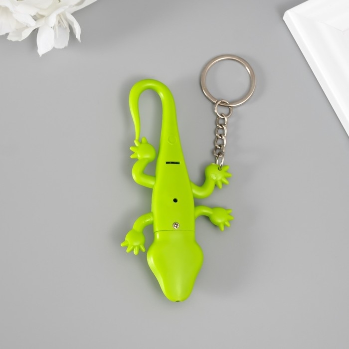 Фонарик кричалка на кольце Фонарик кричалка на кольце "Ящерка"