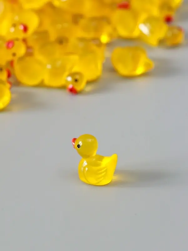 Сувенир полистоун флюоресцентный "Уточки" набор 100 шт 1,5х1,5 см